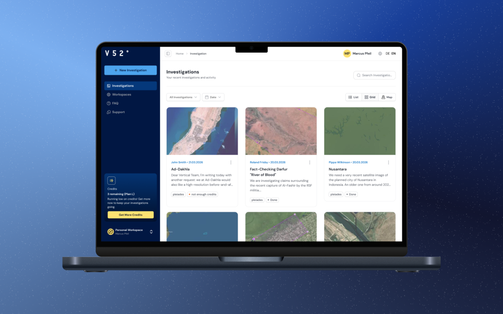 Laptop showing the V52 app in grid view: investigations as tiles with satellite images.