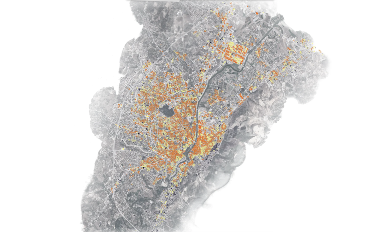 Radar satellite image of Antakya with damaged buildings marked in orange and yellow, mostly in the city centre.